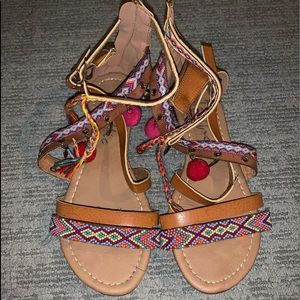 pom tassel ankle sandals